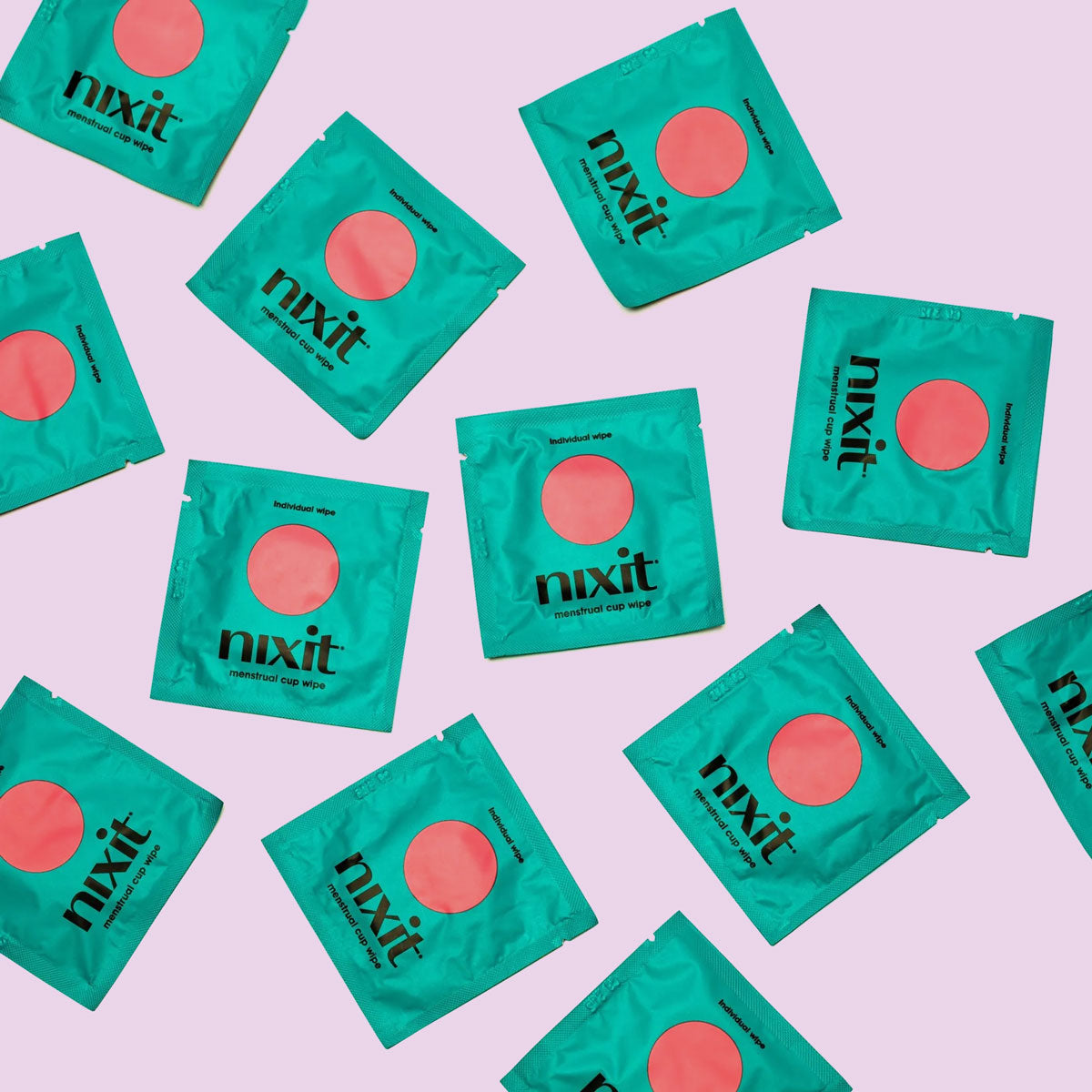 Nixit menstrual cup wipes individual packages in green on a purple background