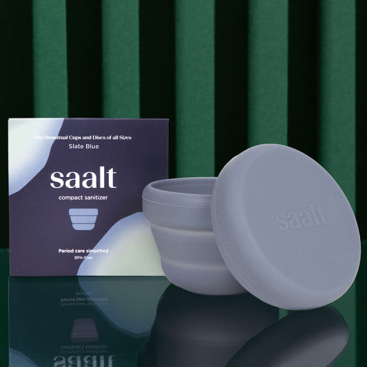 Saalt slate blue compact sanitizer package and product side by side