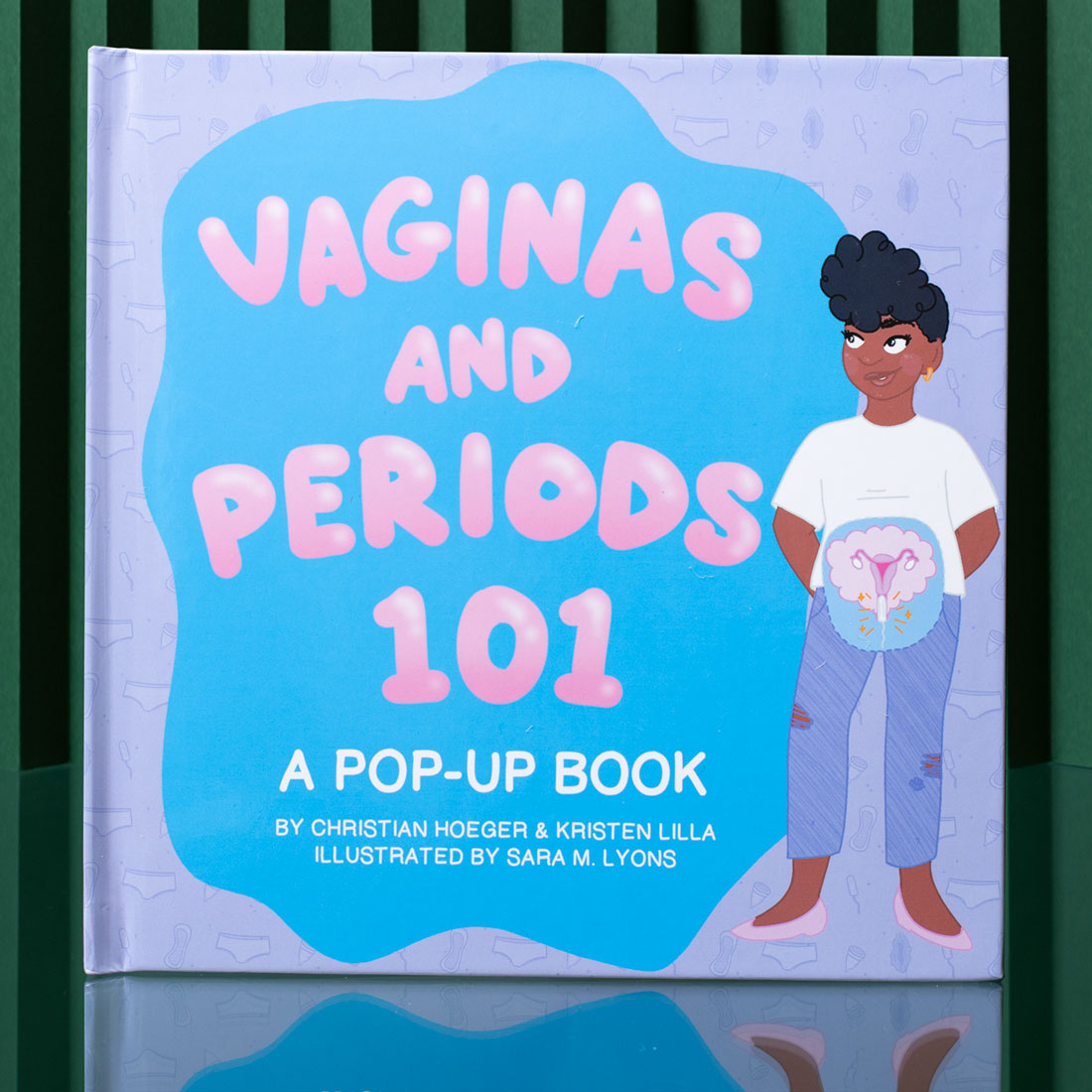 vaginas and periods 101 pop-up period education book with purple and pink bubble letters 