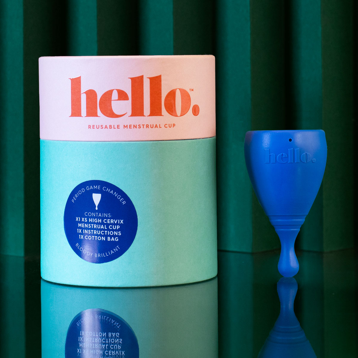 XS Hello Cup High Cervix with papertube box on green background