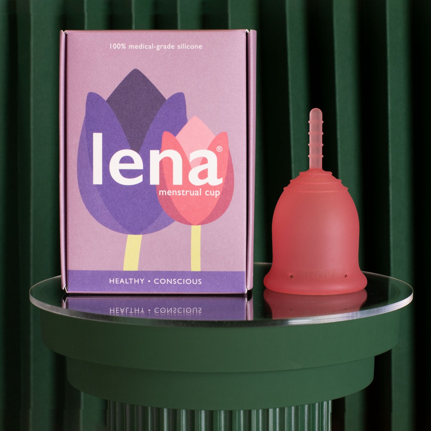 Lena menstrual cup with packaging in pink size small
