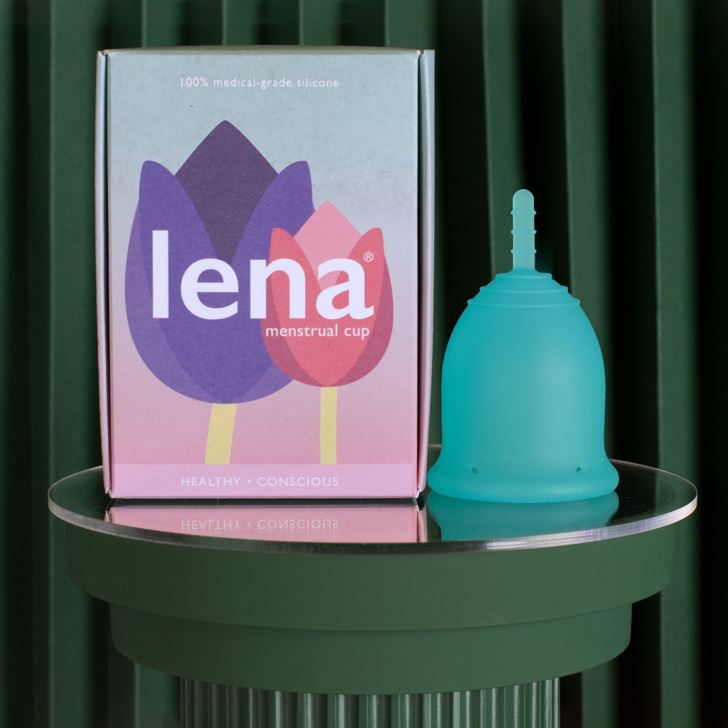 Lena menstrual cup with packaging in turquoise size large